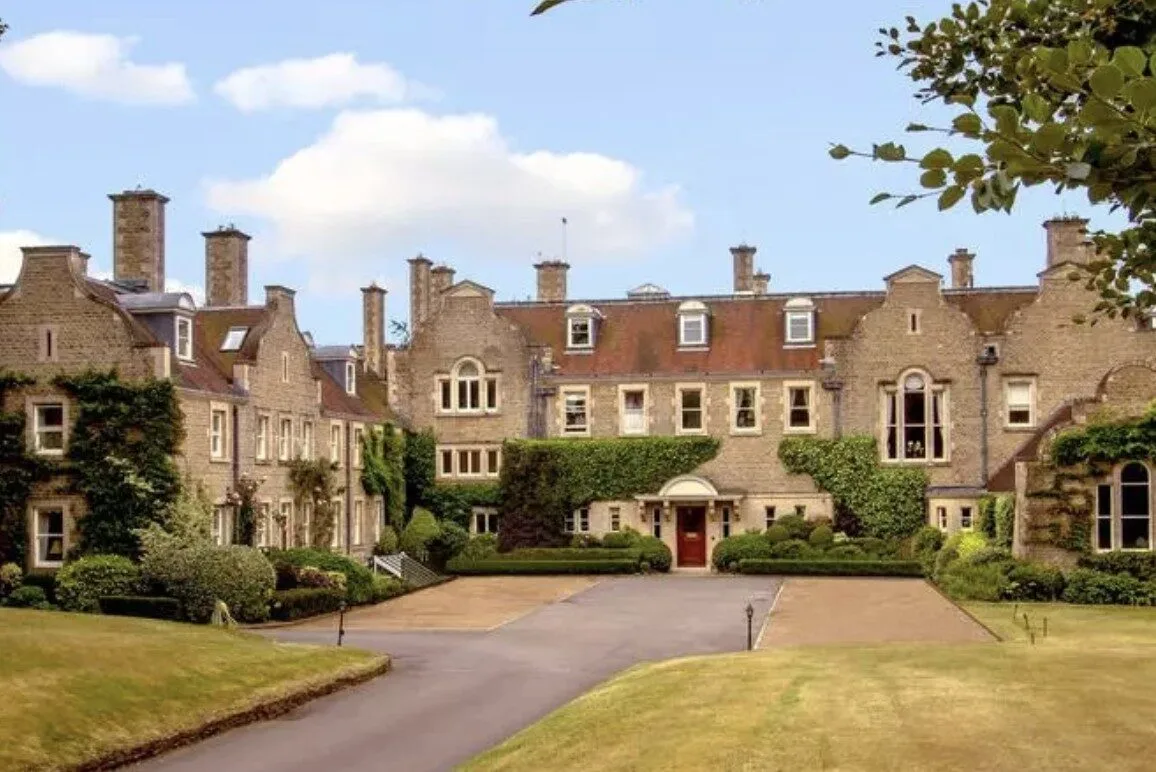 BBQ Sparks Massive Fire at Historic Busbridge Hall in Godalming – Fire Crews Battle Blaze with Eight Engines