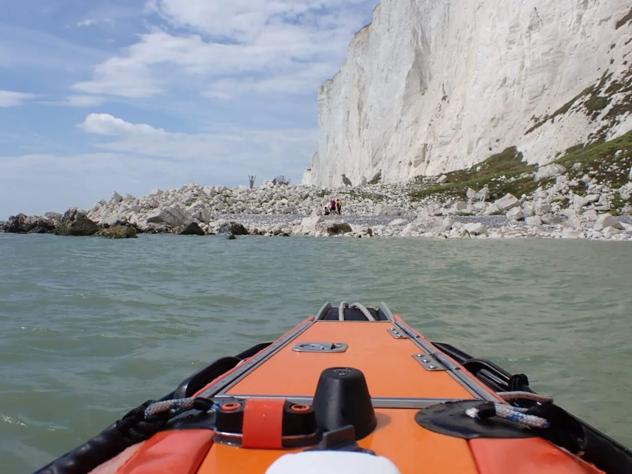 Four Rescued After Tide Traps Family Near Beachy Head Lighthouse – Eastbourne RNLI Responds Fast