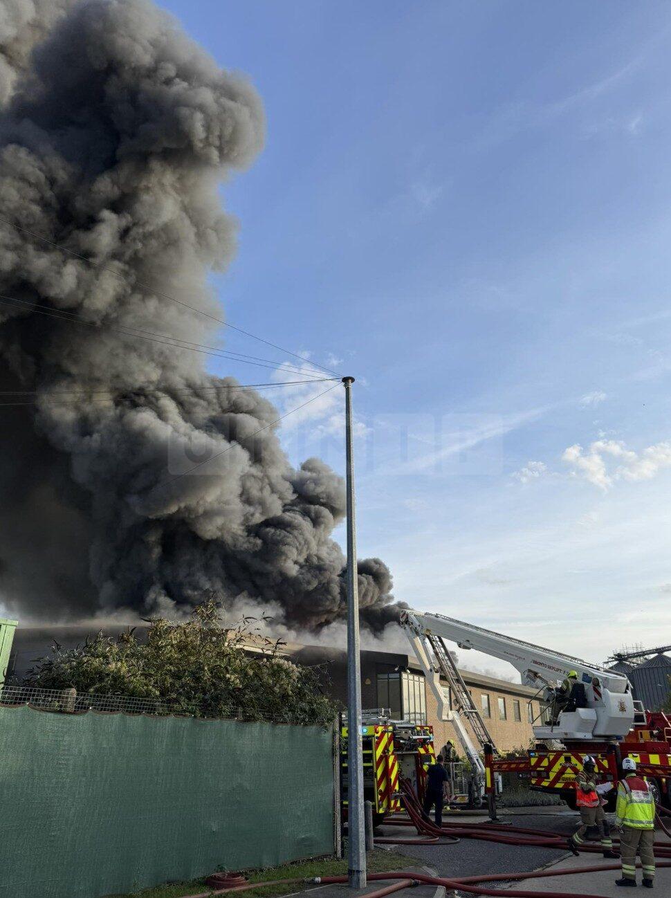 Major Fire at Industrial Building in Witham Prompts Large Emergency Response
