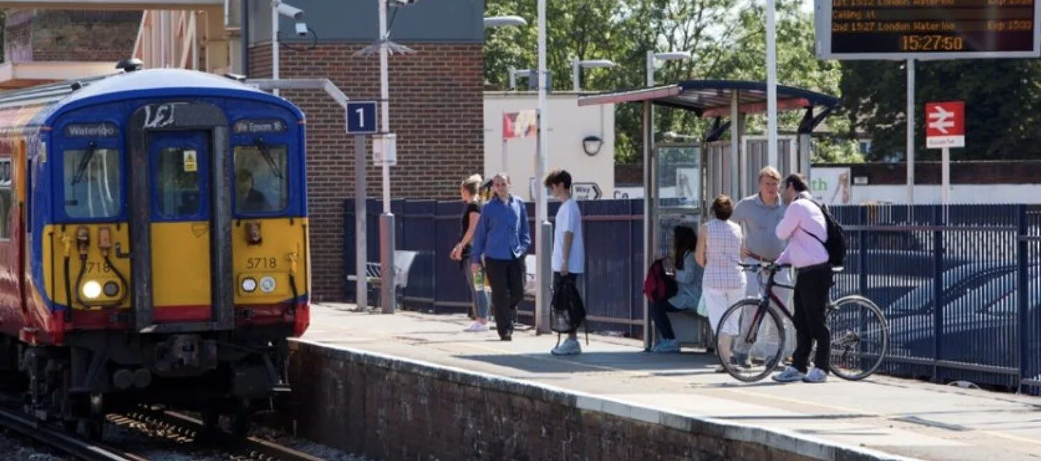 Worcester Park Shock: Man in 60s Survives After Blonde Woman Pushes Him onto Tracks