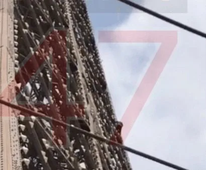 Eiffel Tower Evacuated After Man Climbs Exterior, Visitors Urged to Reschedule Trips