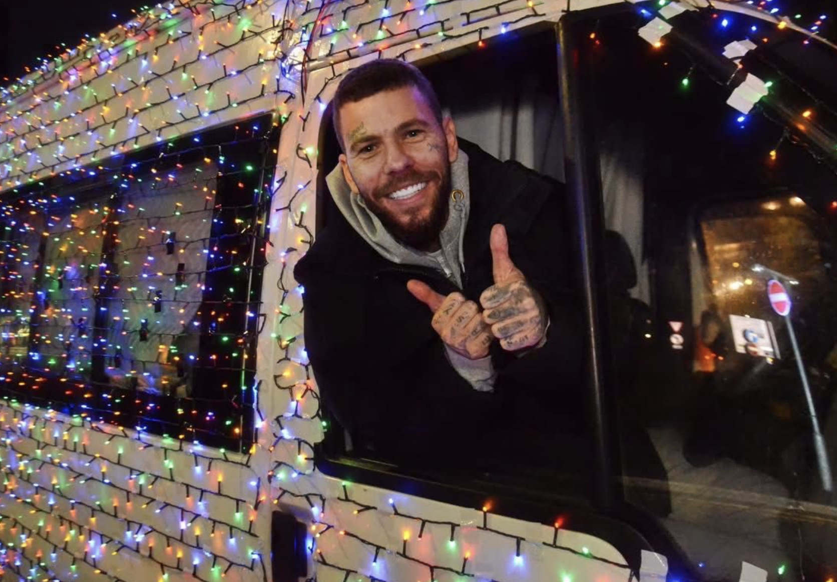 Man’s Christmas Van Packed with 10,000 Lights Brightens Up Town