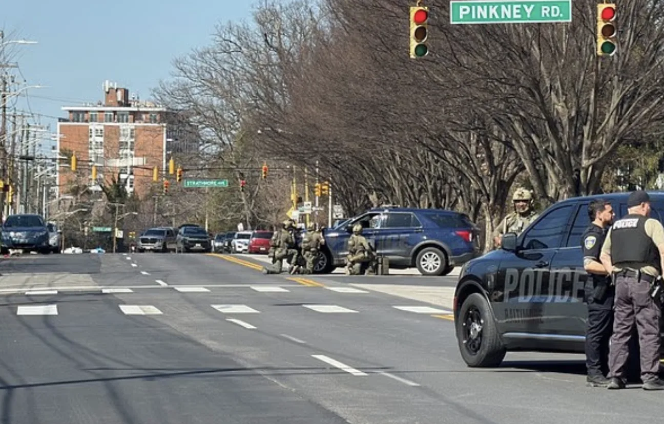 Woman Smashes Window to Escape Baltimore Hostage Crisis as Gunman Shot Dead, Officer Injured in Shootout