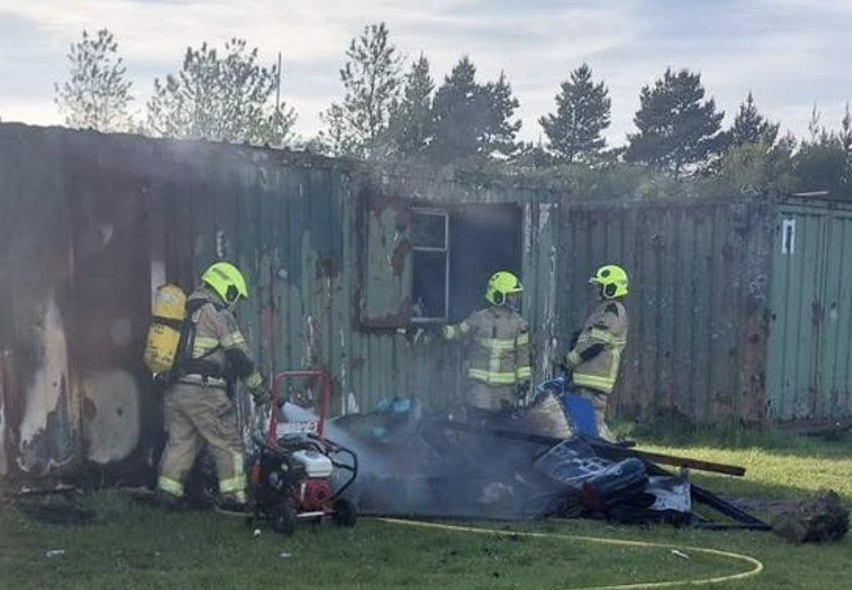 13-Year-Old Arrested After Child Trapped in Carmarthenshire Shipping Container Fire