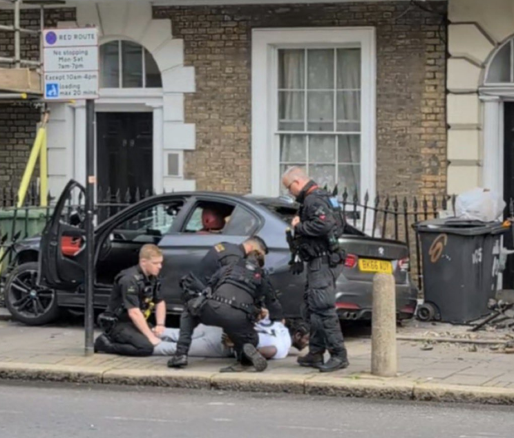 Man Arrested After Police Pursuit Ends in Overturned Police Car in London