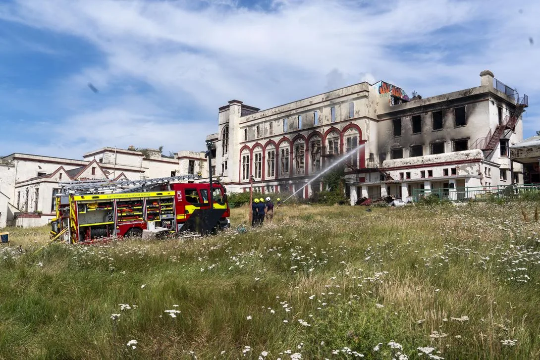 Two boys arrested after major fire tears through former school in St Leonards