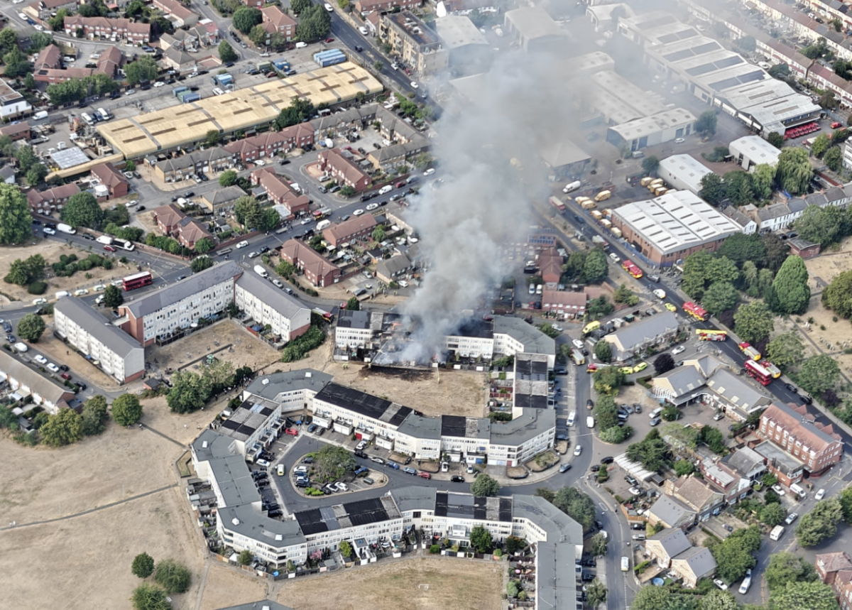 Major fire tears through three-storey block in Mitcham as 125 firefighters tackle blaze