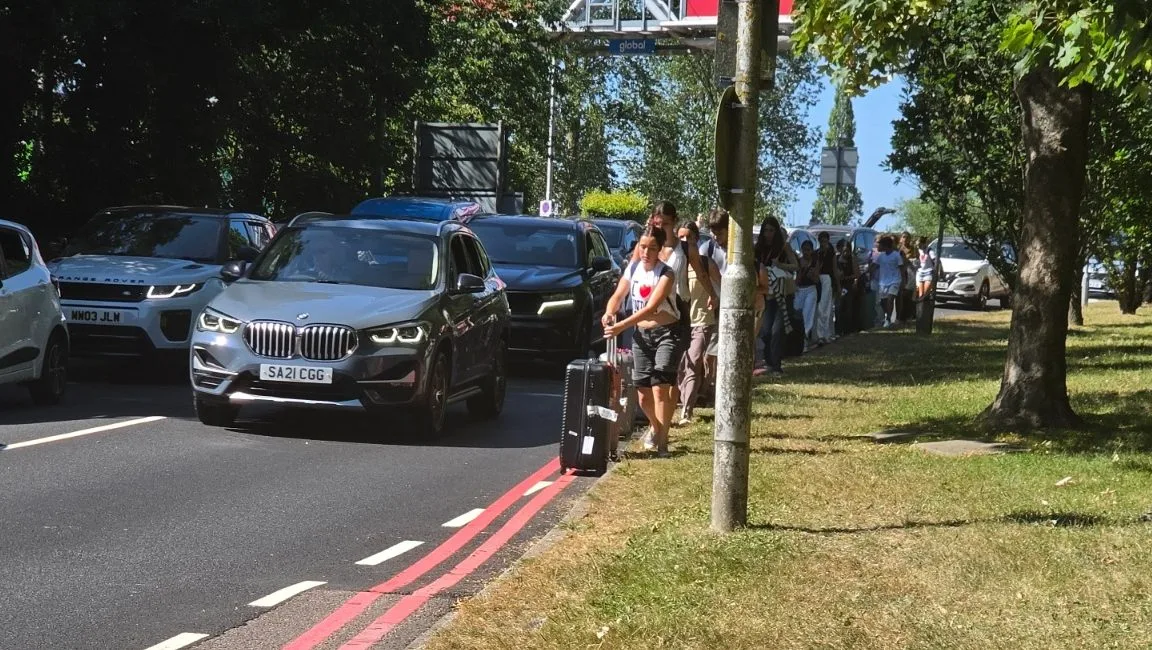 Passengers abandon cars and walk to Gatwick Airport as crash causes major traffic chaos