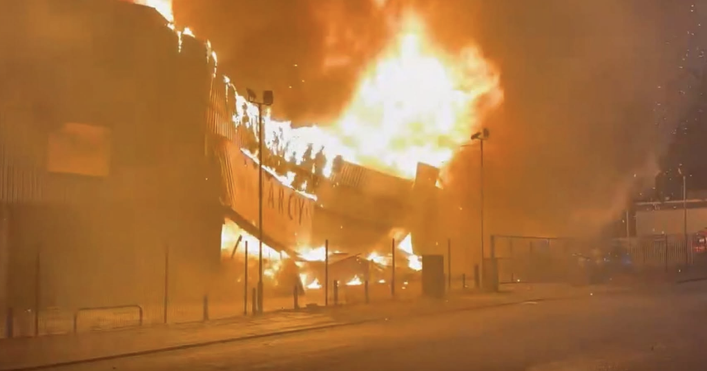 Crews tackle major commercial fire in Salford as road remains closed