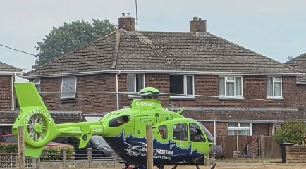 Casualty taken to hospital after major fire spreads to homes near Swindon