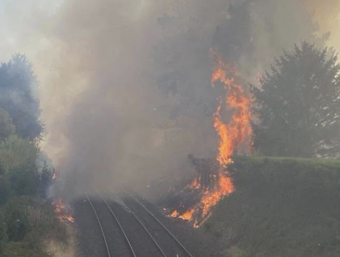 Rail services disrupted after major Stourbridge fire spreads to railway embankments