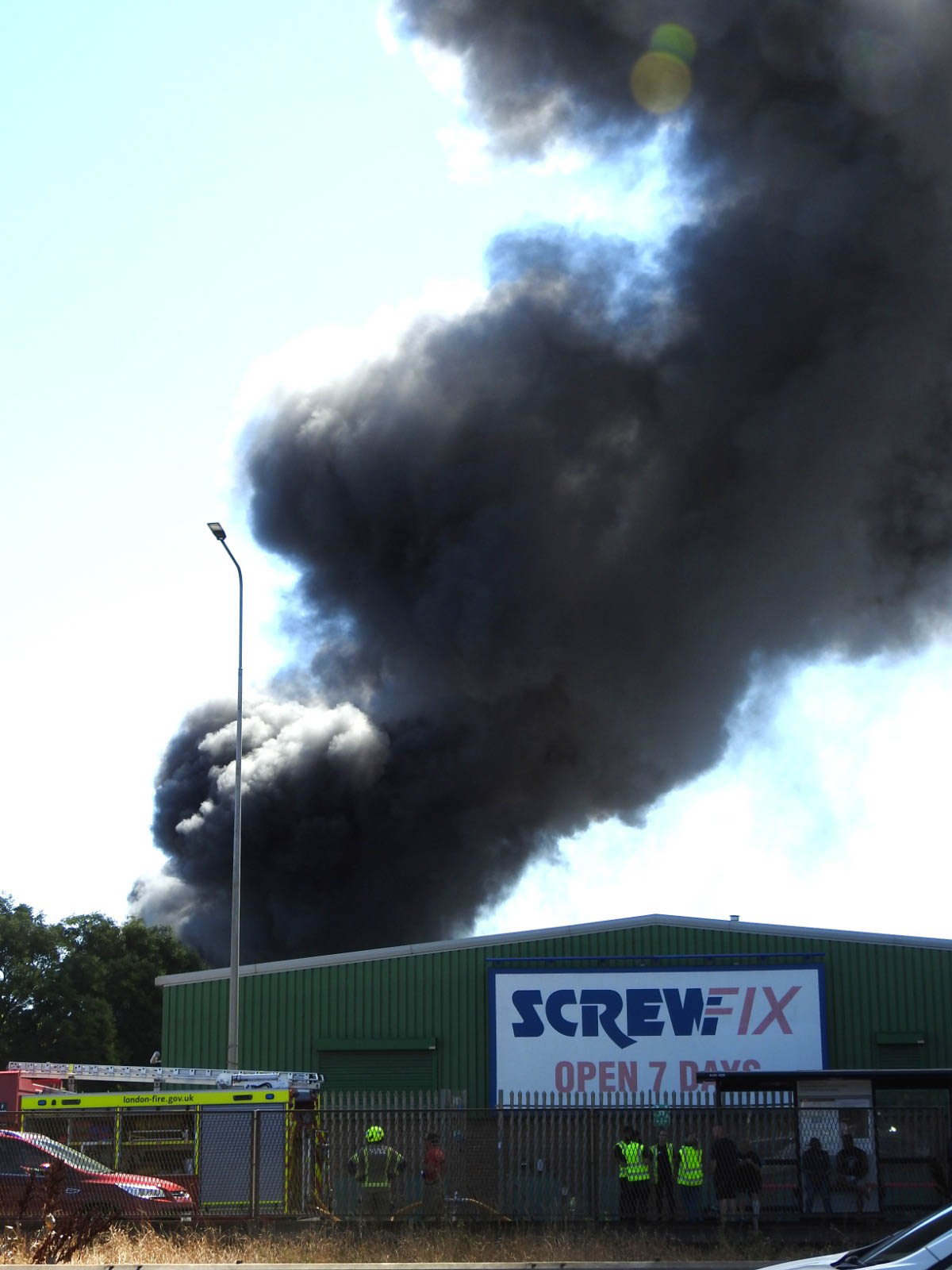 100 firefighters battle huge Barking industrial estate blaze as smoke hits A13