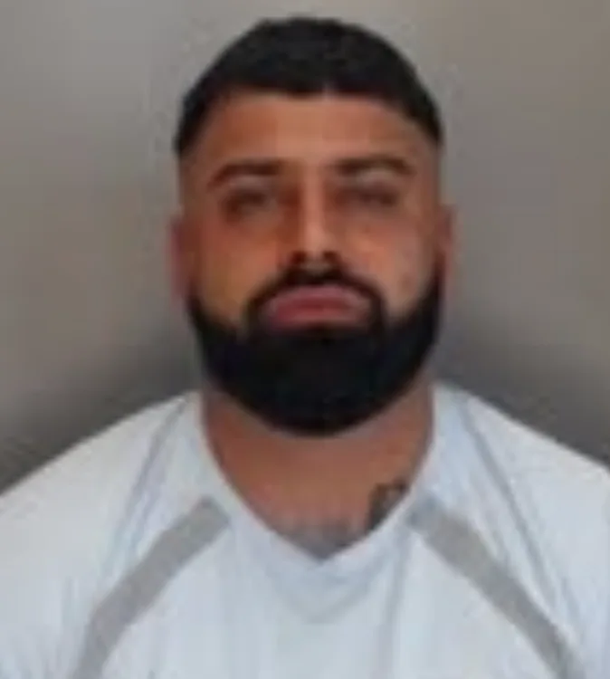 Disqualified BMW driver jailed after hitting 120mph in 30mph zones during police pursuit
