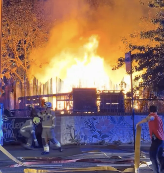Fire tears through Hackney community garden as residents evacuated after ‘loud bangs’