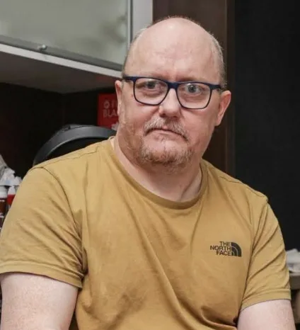 Convicted murderer in hotel stand-off with Manchester council over wheelchair-accessible housing