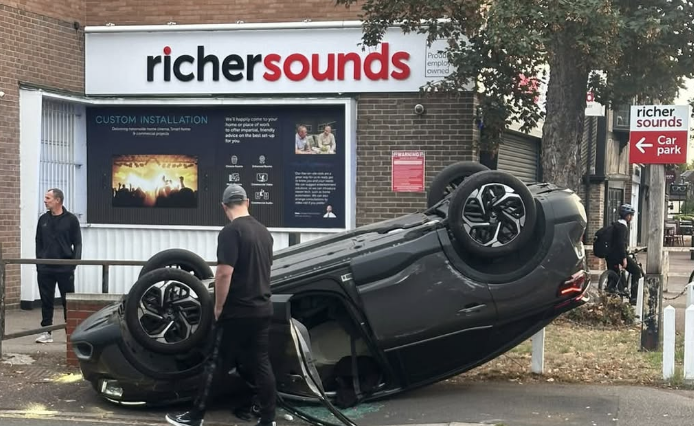 Car overturns onto pavement after crash in Gidea Park, Romford