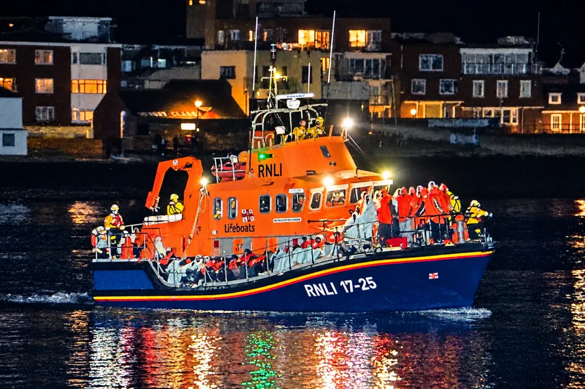 Twelve arrested after clashes at Gosport protest as 149 migrants brought ashore