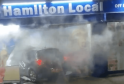 Car Crashes into Feltham Shopfront and Catches Fire in Dramatic Late-Night Incident