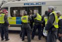 Eight arrests after rioters hurl bottles at police in Croydon