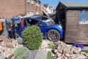 Electric Car Crashes Into Shed in Newton Abbot Garden — Fire Crews Make Scene Safe