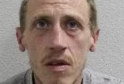 A serial burglar has been jailed for 12 years after detectives identified him through fingerprints left on a box of alcohol he discarded while fleeing a scene
