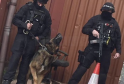 Three Men Charged with Terror Offences After Raids Across Greater Manchester